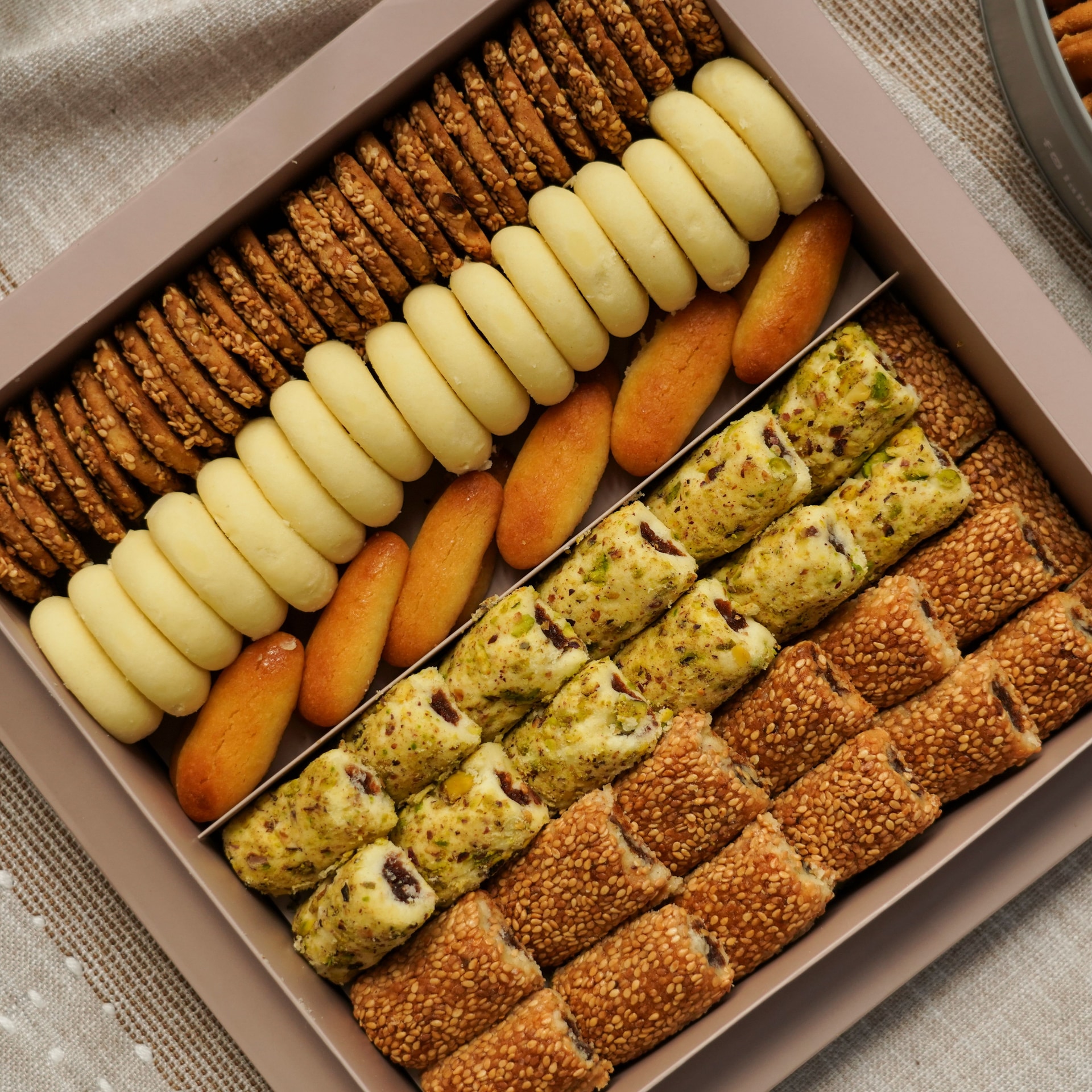 A boxed selection of cakes and pastries prepared as a gift