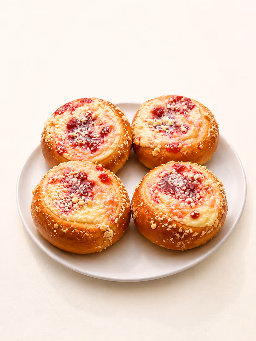 Blueberry buns, vatrushki and a plyushka side by side